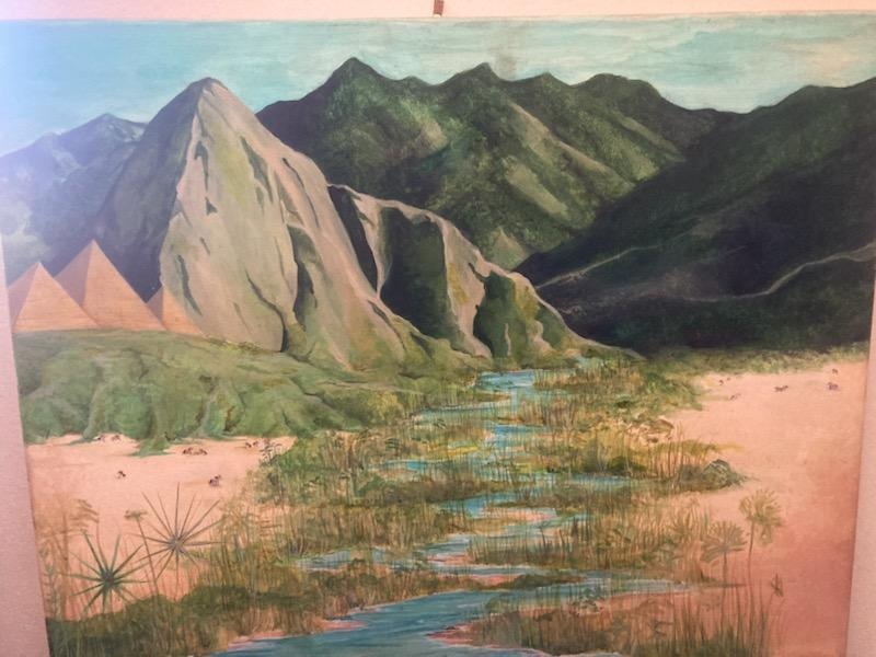 Dramatic mountain peaks above a colorful valley
